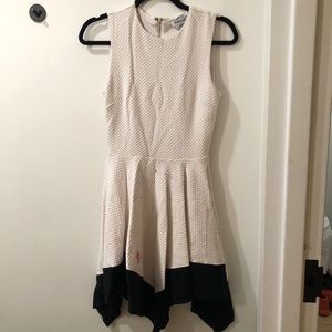 Bebe white and black dress. Stained -discounted